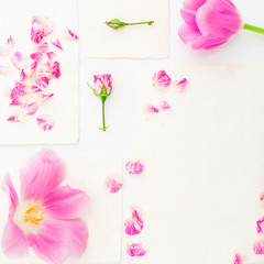 Flowers and paper cards. Flat lay, Top view