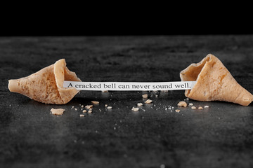 Fortune cookie on color background