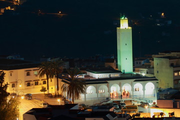 Night view of a mosque in the town of Chaouen, Morocco