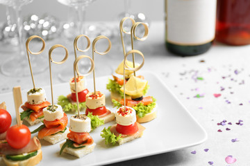 Assorted canapes on table closeup