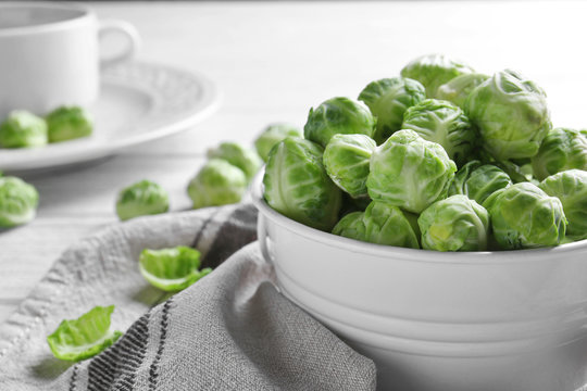 Brussels sprouts in small decorative bucket on napkin
