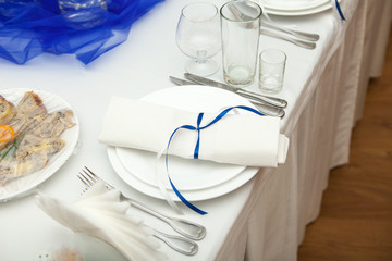 Elegant tables set up for a wedding banquet