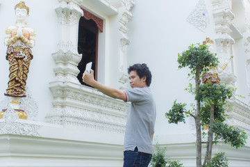 thai man Selfie at thai temple