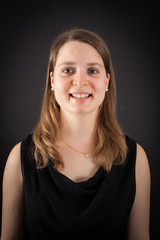 Beautiful woman doing different expressions in different sets of clothes: smile