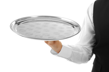 Male waiter holding tray on white background