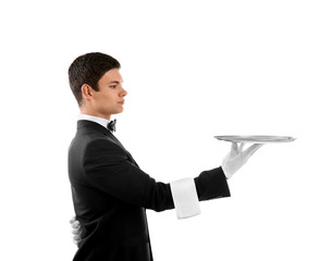 Male waiter holding tray on white background