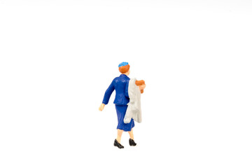 Miniature people business traveler on background with space for text