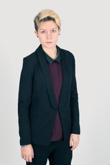 Beautiful woman doing different expressions in different sets of clothes: angry