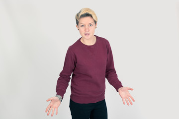 Beautiful woman doing different expressions in different sets of clothes: surprise