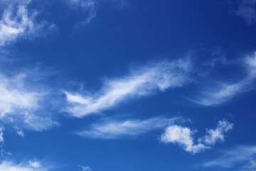 Beautiful white clouds with blue sky background