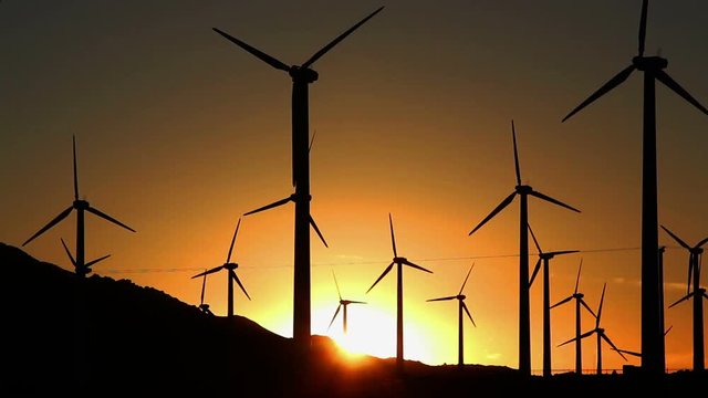 Footage - Wind Turbines with Sunset at the background