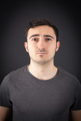 Handsome Man doing different expressions in different sets of clothes: sad