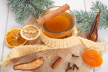 Spruce branches and traditional compote of dried fruits for Christmas