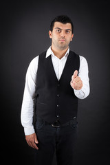 Handsome man doing different expressions in different sets of clothes: gun sign