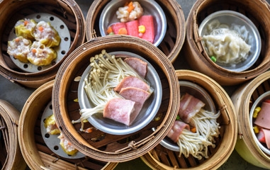 dim sum in bamboo steamer, chinese cuisine.