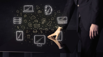 Man pressing table tablet hand touch interface with media icons