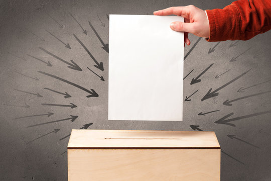 close up of a ballot box and casting vote