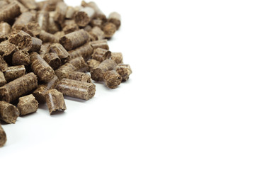 stack of wooden pellets for bio energy, white background, isolated