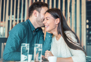 Romantic loving couple having a date in a cafe