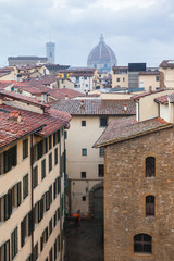 Fototapeta na wymiar above view of old houses in Florence city in rain