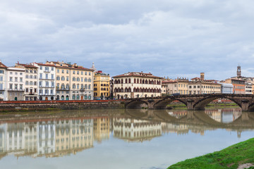 view of Ponte alla Carraia over Arno in autumn