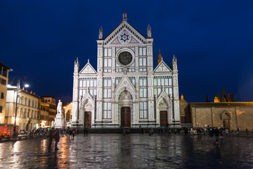 Fototapeta na wymiar Basilica di Santa Croce on Piazza in rainy night