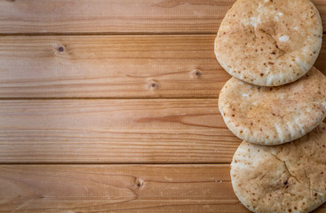 Pita, Arabic bread, wooden background, free text space