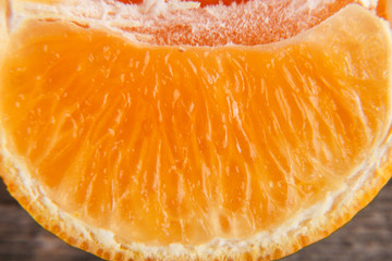 Macro texture of sliced mandarin/citrus close up