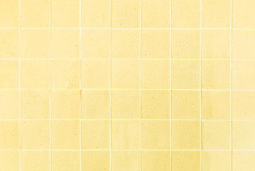 background and texture of stretch marks cracked on yellow glazed