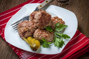 Meatball with parsley.