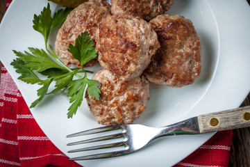 Meatball with parsley.