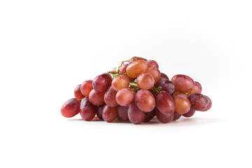 Fresh purple grapes on a white background