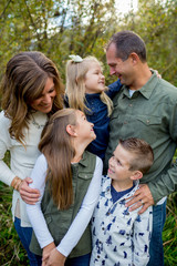 Fototapeta premium Lifestyle Portrait of a Five Person Family Outdoors