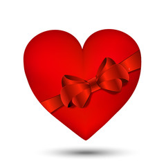 Red heart with red bow and ribbons isolated on white background