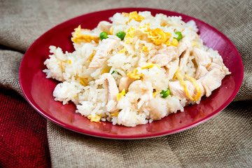 Homemade Chinese fried rice with vegetables and fried eggs