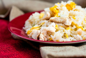 Homemade Chinese fried rice with vegetables and fried eggs