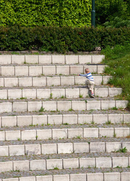 Child climbing staircase
