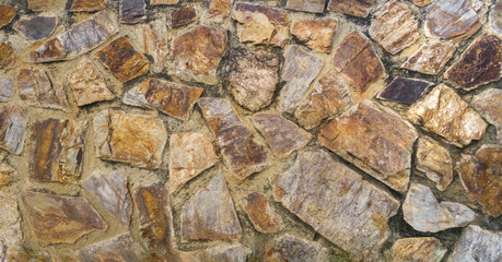 Stone wall texture on the beach
