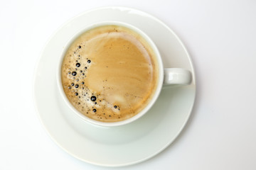 white cup with espresso coffee isolated on white