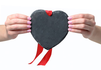     Female hands holding a Valentine's day heart on a white background (no text) 

