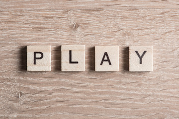 Fototapeta premium wooden elements with letter collected to word play