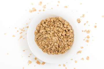 Bowl of granola, on white background.