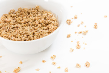 Bowl of granola, on white background.