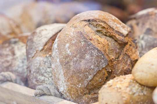 Closeup image of a big round integral loaf bread.