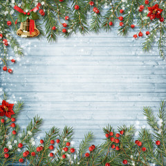 Fototapeta na wymiar Christmas decoration with bell and holly on a wooden background