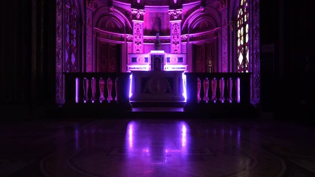 Art performance with led lights in a deconsecrated church