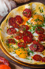 Omelette with chorizo and herbs