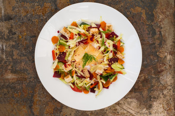 Vegetarian salad with vegetables and cheese crisps. Old table. Top view. Close-up