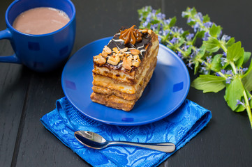Fresh cream cake slice on a wooden table. Top view