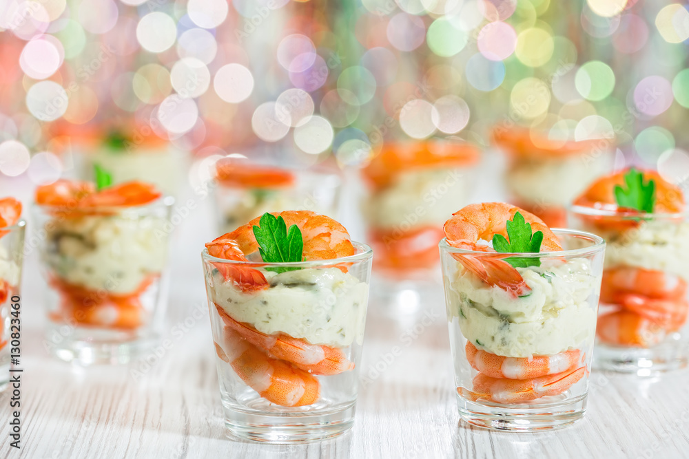 Wall mural cocktail shrimp shot glasses with delicious homemade tartar spic